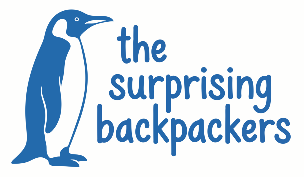 Logo for The Surprising Backpackers with penguin