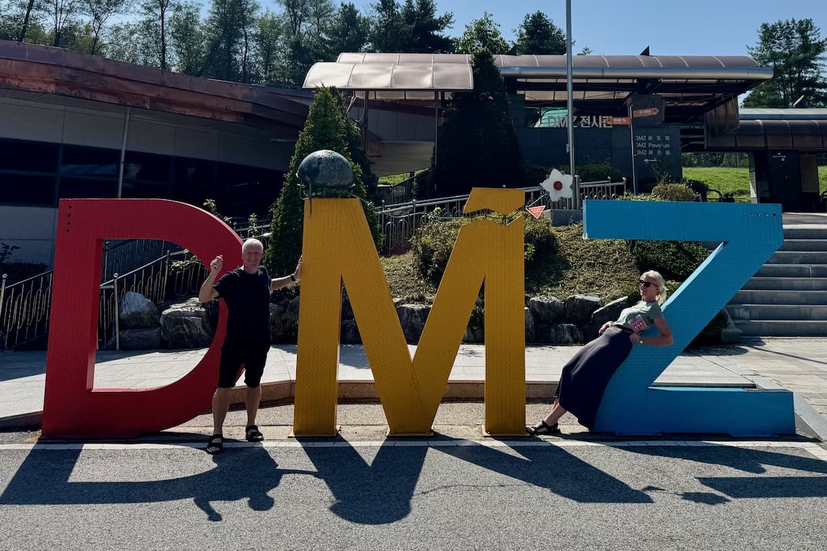 Couple at DMZ letters at border in Korea