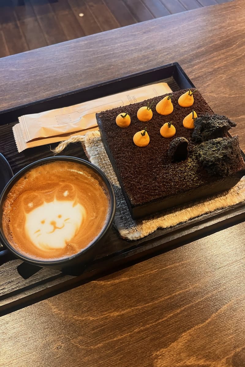 Coffee and carrot cake on Aewal Cafe Street, Jeju, Korea