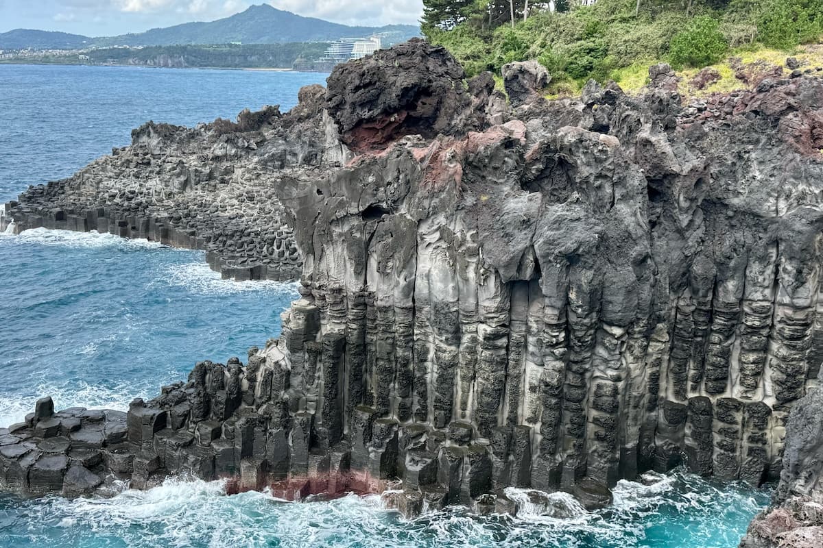 Polygon basalt rocks on coast of Daepo Jusangjeolli Cliff on Jeju