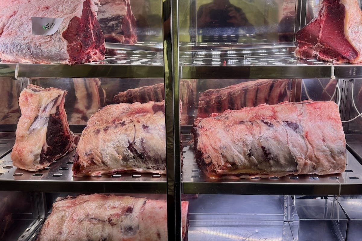 Meat on display in restaurant fridge in Florence, Italy