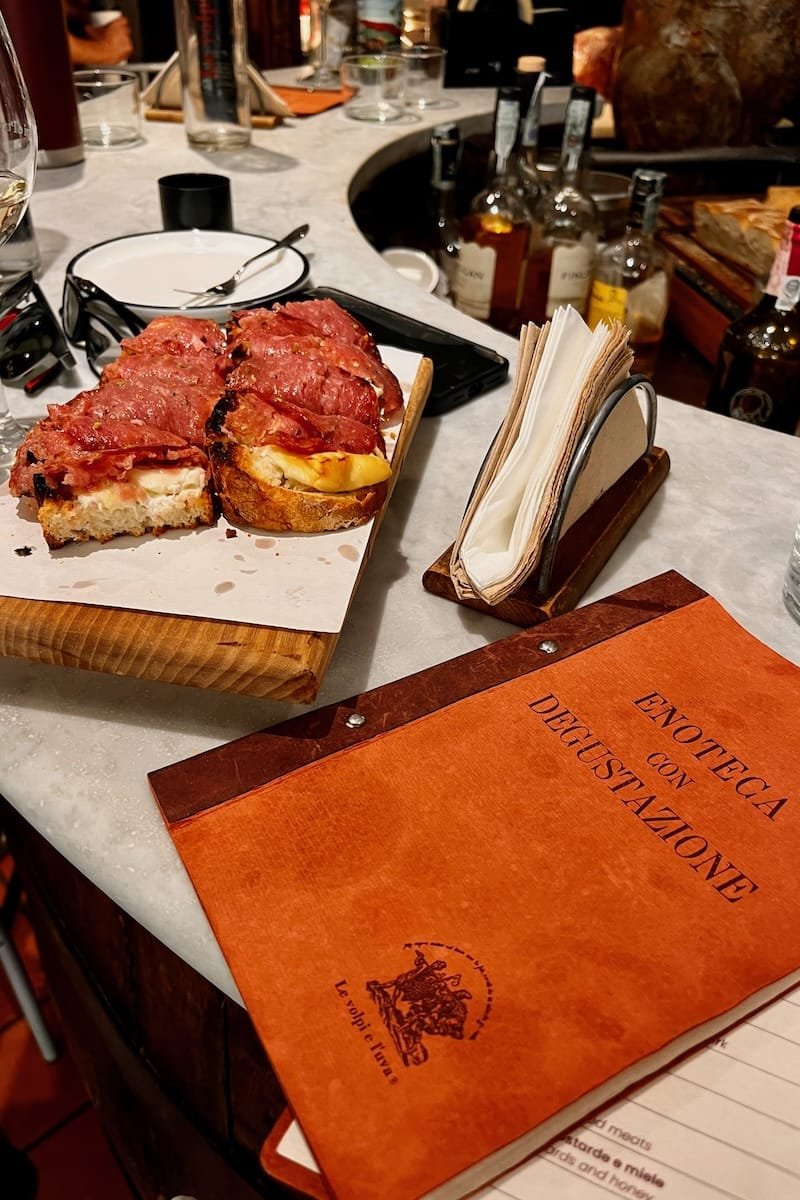 Cured meats from Tuscany and local wine in Florence, Italy