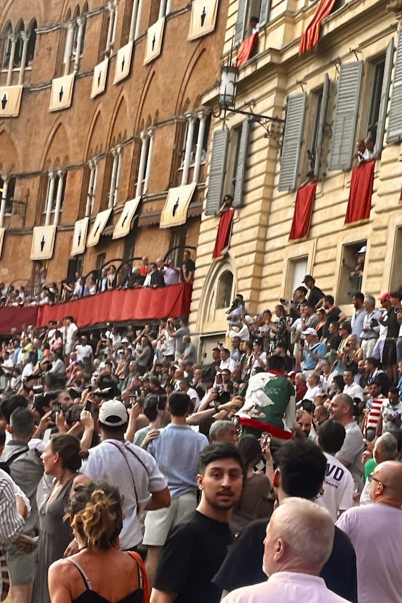 Winner of Palio di Siena swamped by crowd