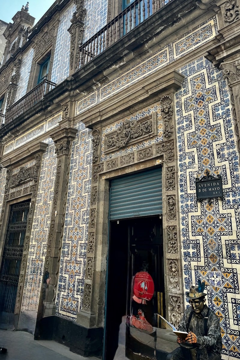Ornate blue and white tiles on La Cash De Los Azulejos in Mexico City