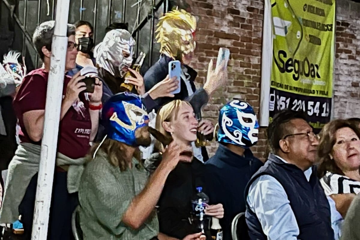 Audience in masks watching Lucha Libre in Oaxaca, Mexico