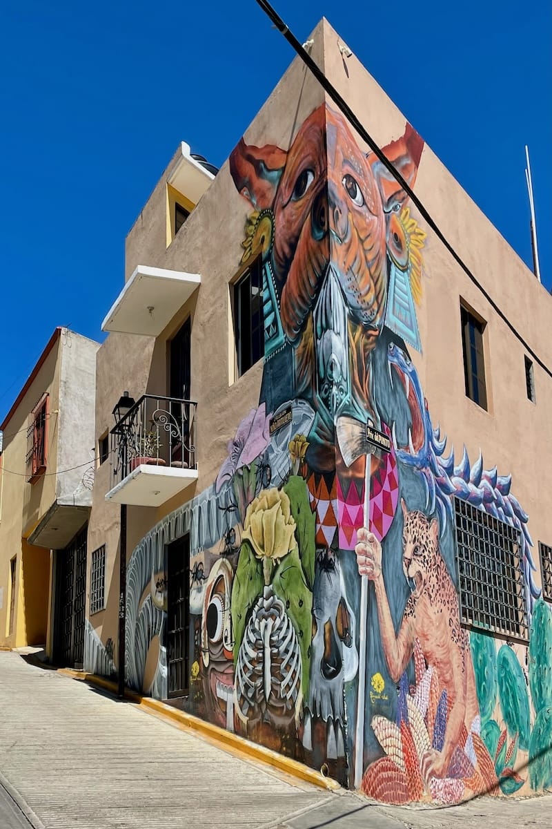 Mural on corner of building in Oaxaca, Mexico