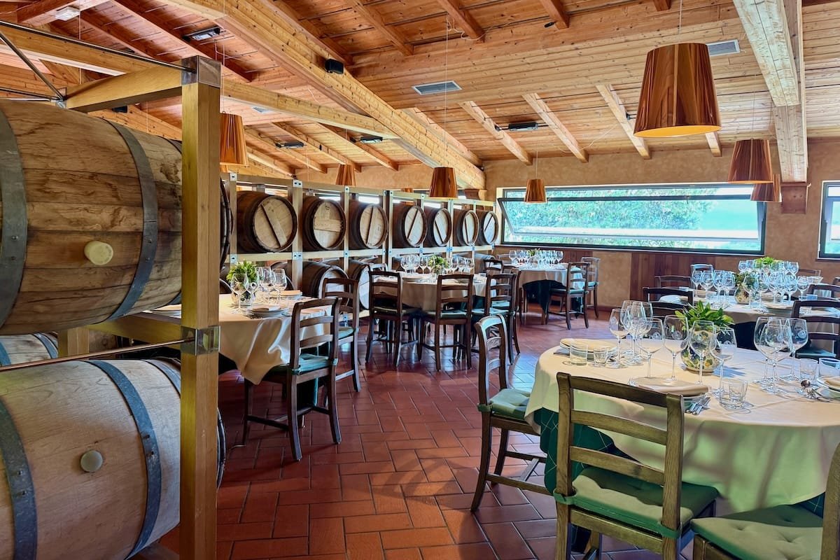 Wine barrels and tables at Castello di Verrazzano in Florence, Italy